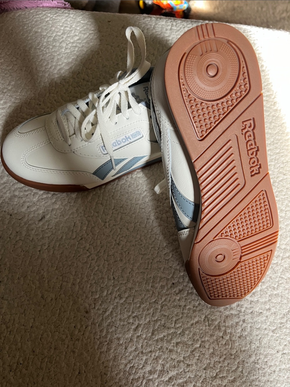 Reebok Women’s White Athletic Sneakers with Light Blue Accents and Gum Outsole